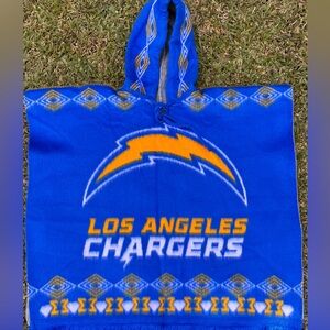 Kids size Chargers alpaca poncho, hooded with adjustable strings,made in Ecuador